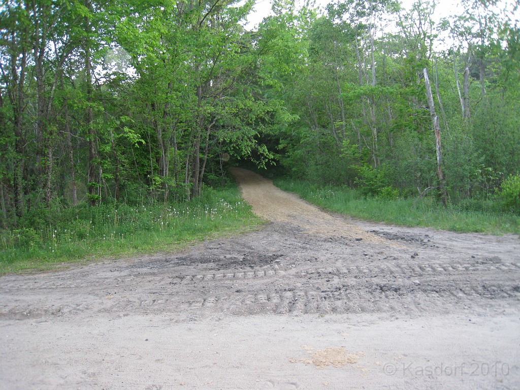 Old Hill Village - South End 430.jpg - In February 1937, residents of Hill Village NH learned that their village, near the Pemigewasset River, was to become a flood control reservoir for the Franklin Falls dam project. To accommodate the construction of the Franklin Falls Dam, the village of Hill NH was to be relocated. By January of 1940, the citizens of Hill NH formed an association, purchased land, and began planning a new model village with the help of the NH State Planning and Development Commission. Construction started in 1940, and by June of 1941 the new town hall and school were completed, along with the streets, water system, and 30 houses. The 1941 town meeting was called to order in the old town hall, recessed, and reconvened in the new village.